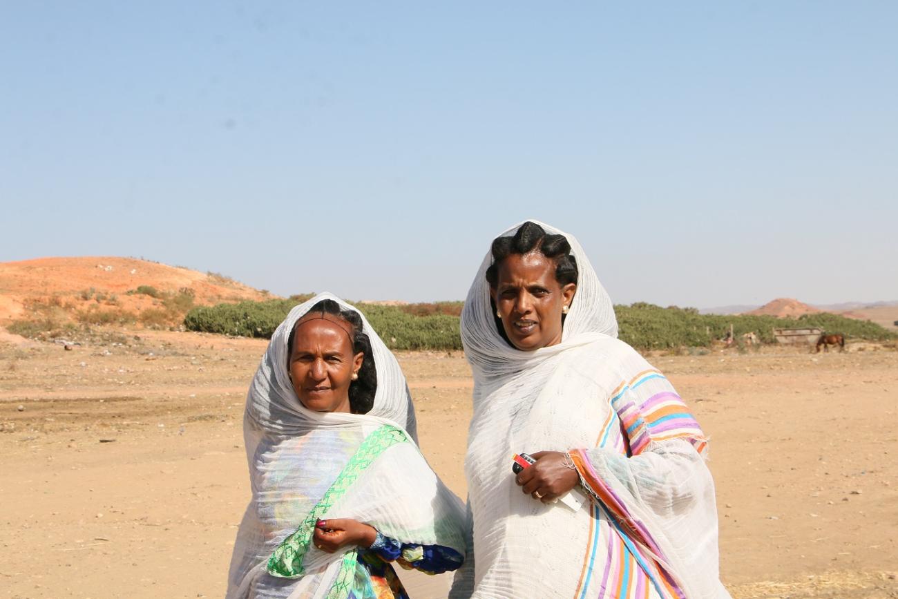 Genet Mahari (left) and Tieba Abraha are trained community health volunteers who go house to house in their community and can screen and detect malnutrition among children under five.
