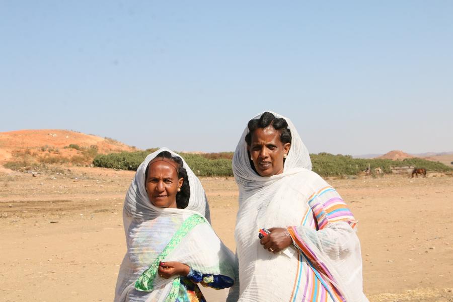 Genet Mahari (left) and Tieba Abraha are trained community health volunteers who go house to house in their community and can screen and detect malnutrition among children under five. 